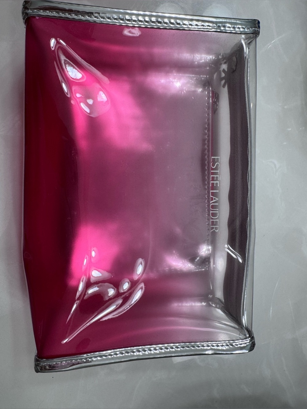 Estee Lauder pink clear cosmetic bag with matching small pouch